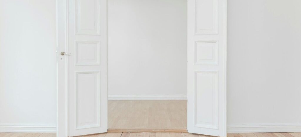 minimalist photography of open door